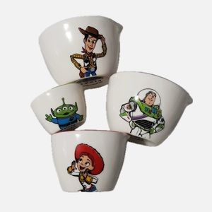 NWT Rae Dunn Toy Story Measuring Cups featuring Woody, Buzz, Jessie, and Alien